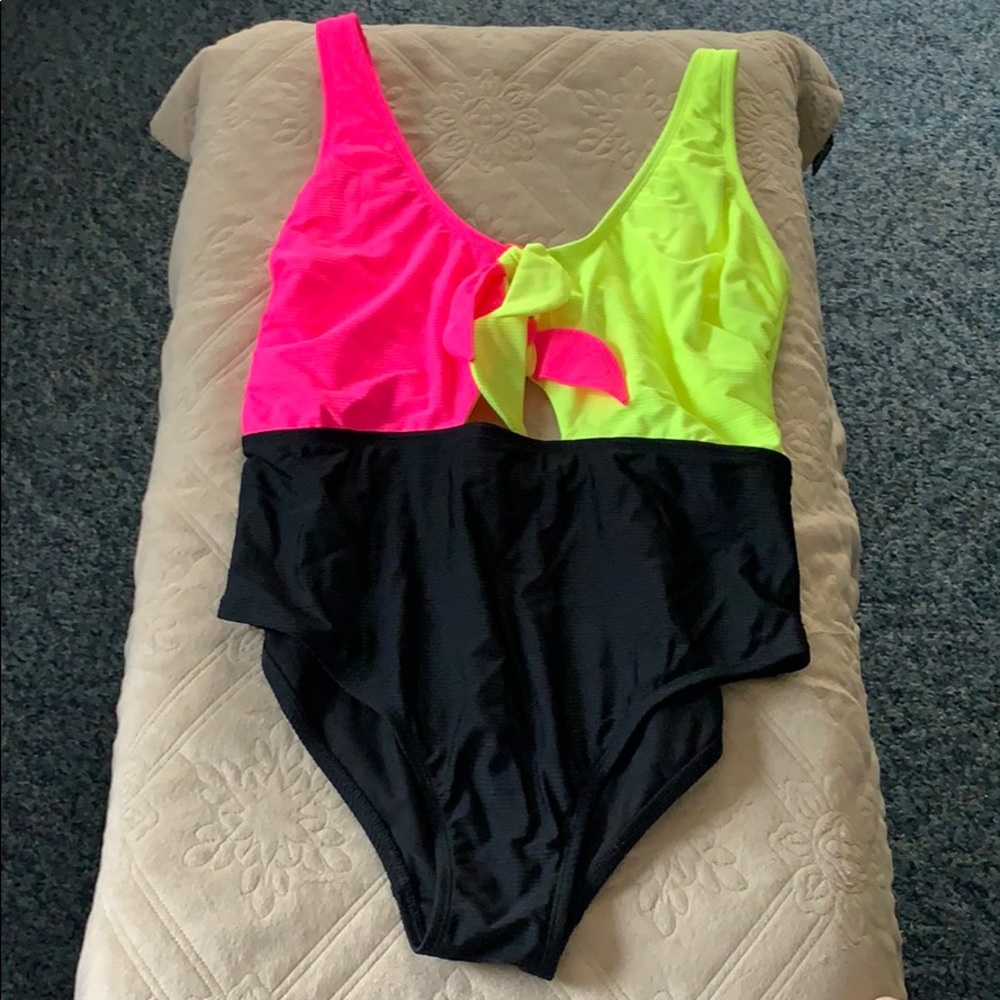 Neon pink and yellow one piece swimsuit brand new
